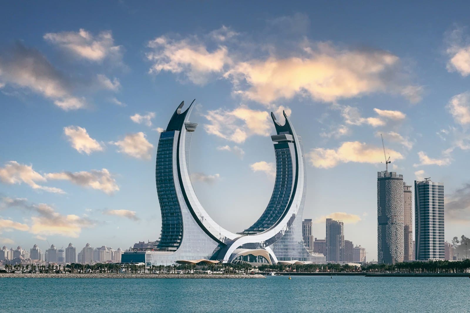 The crescent-shaped Katara Towers on the waterfront in Doha