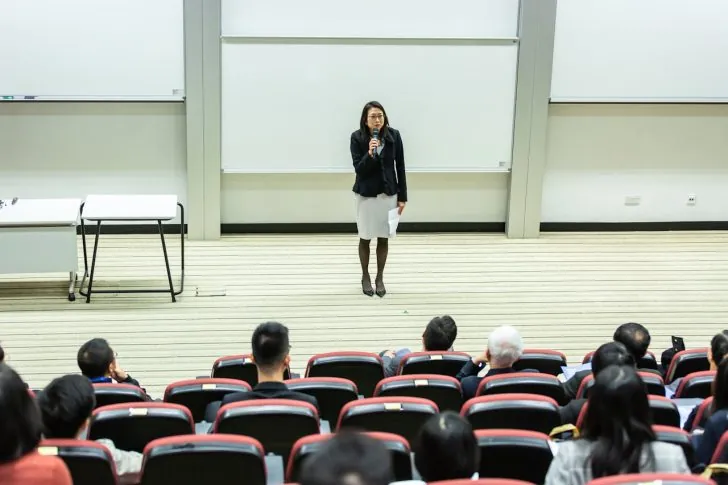 A university teacher teaching a diverse class of students